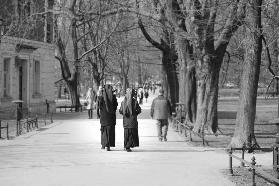 grayscale photo of two nuns